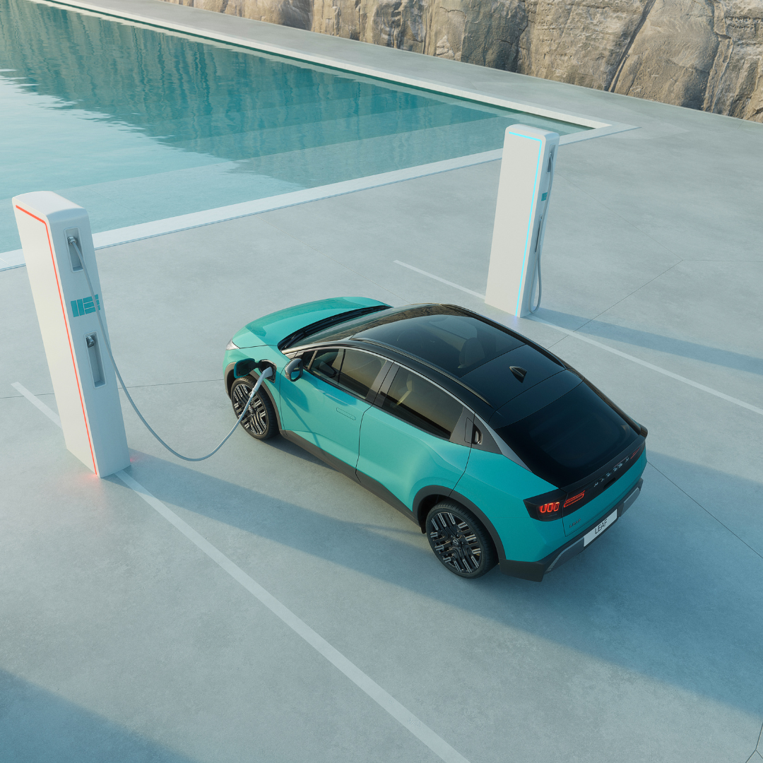 Electric car charging at a station near a pool.