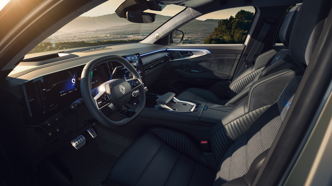 Interior of a modern car with leather seats and digital dashboard.