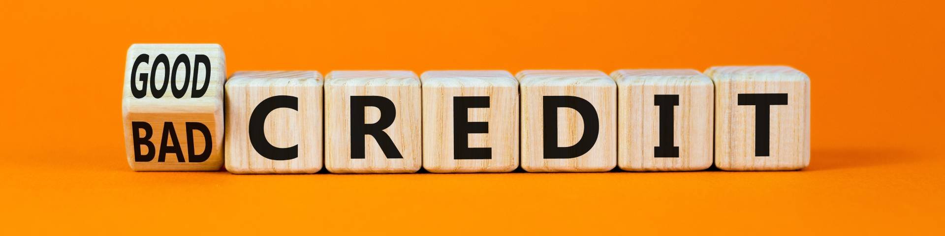 Wooden blocks saying good bad credit