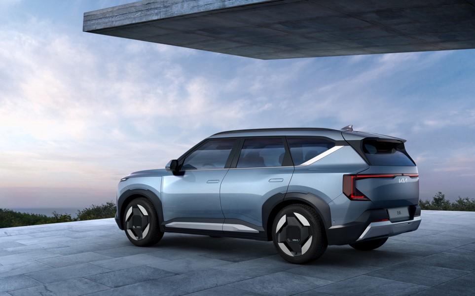 Silver SUV parked on a terrace with blue sky in the background.