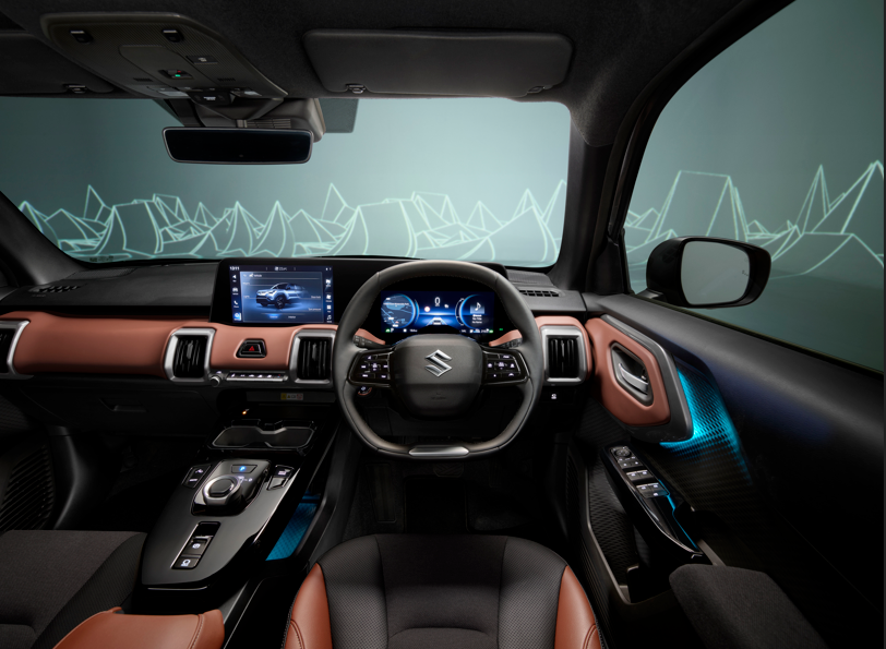 Car interior with black dashboard, digital display, and brown accents.