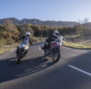 2 honda bikes on road