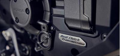 Close-up of a motorcycle's dual clutch transmission labelled Dual Clutch Transmission.