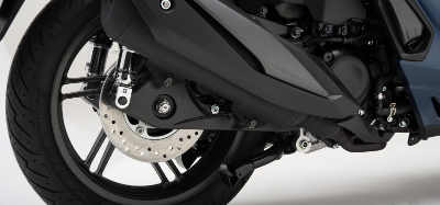 Zoomed in picture of scooter rear wheel breaking system