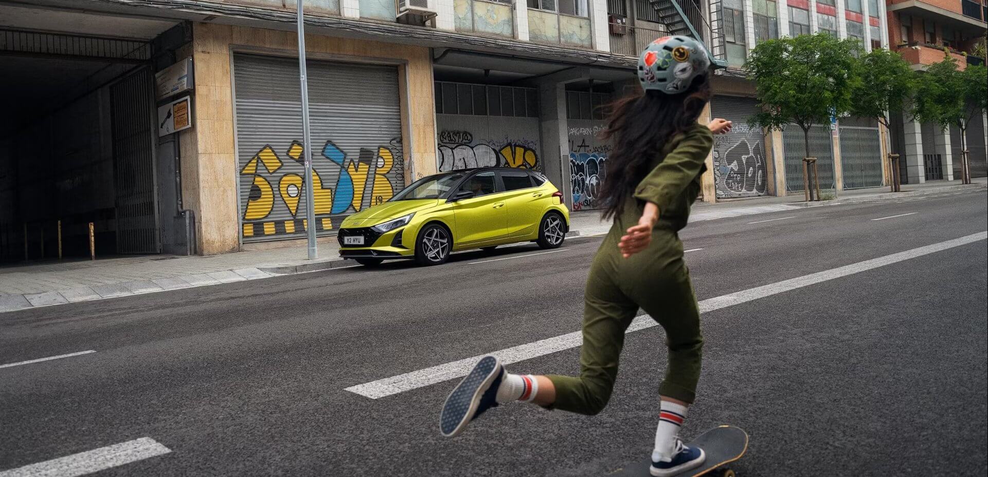 Hyundai i20 Yellow with skateboarder