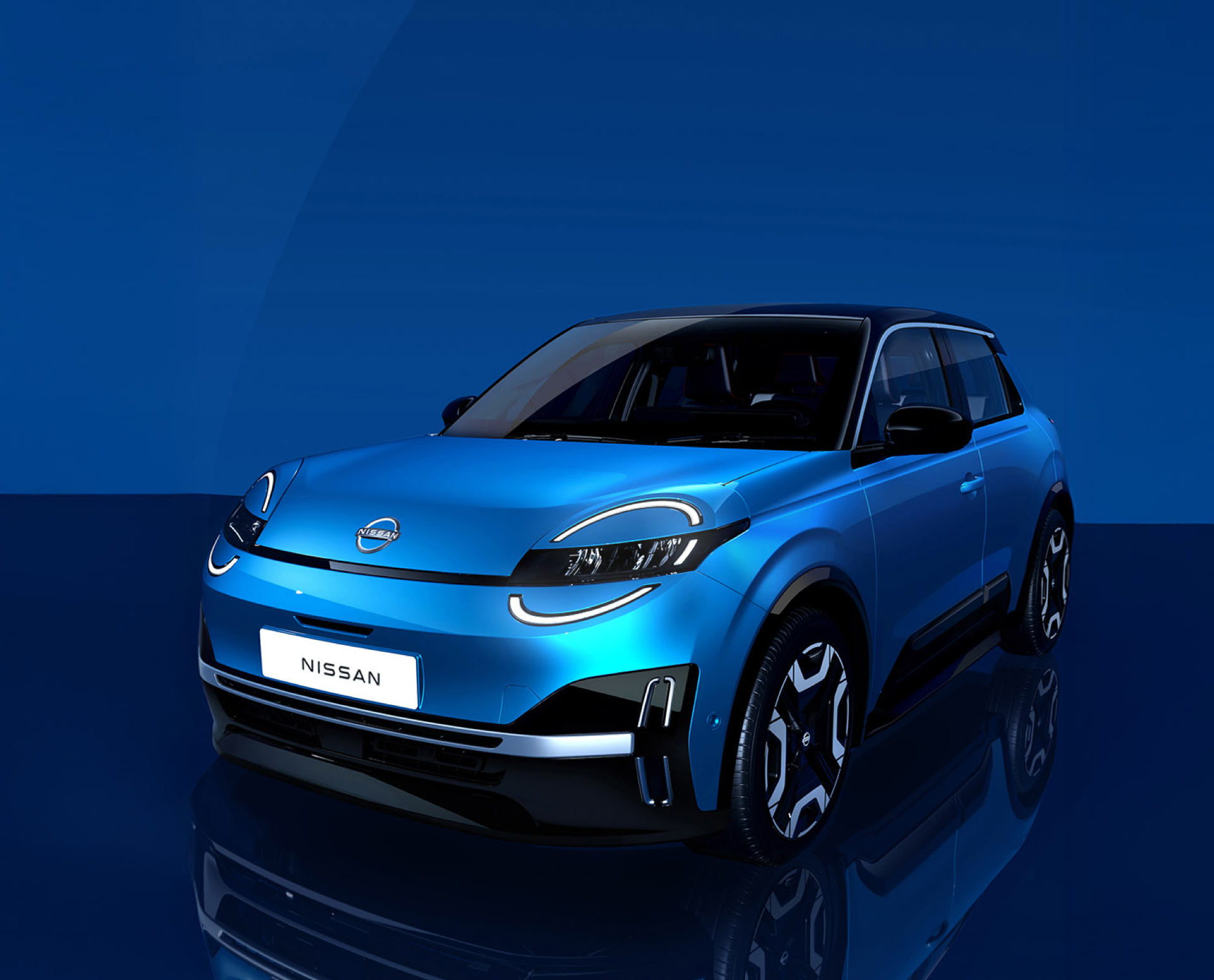 Blue Nissan car displayed on a reflective surface.
