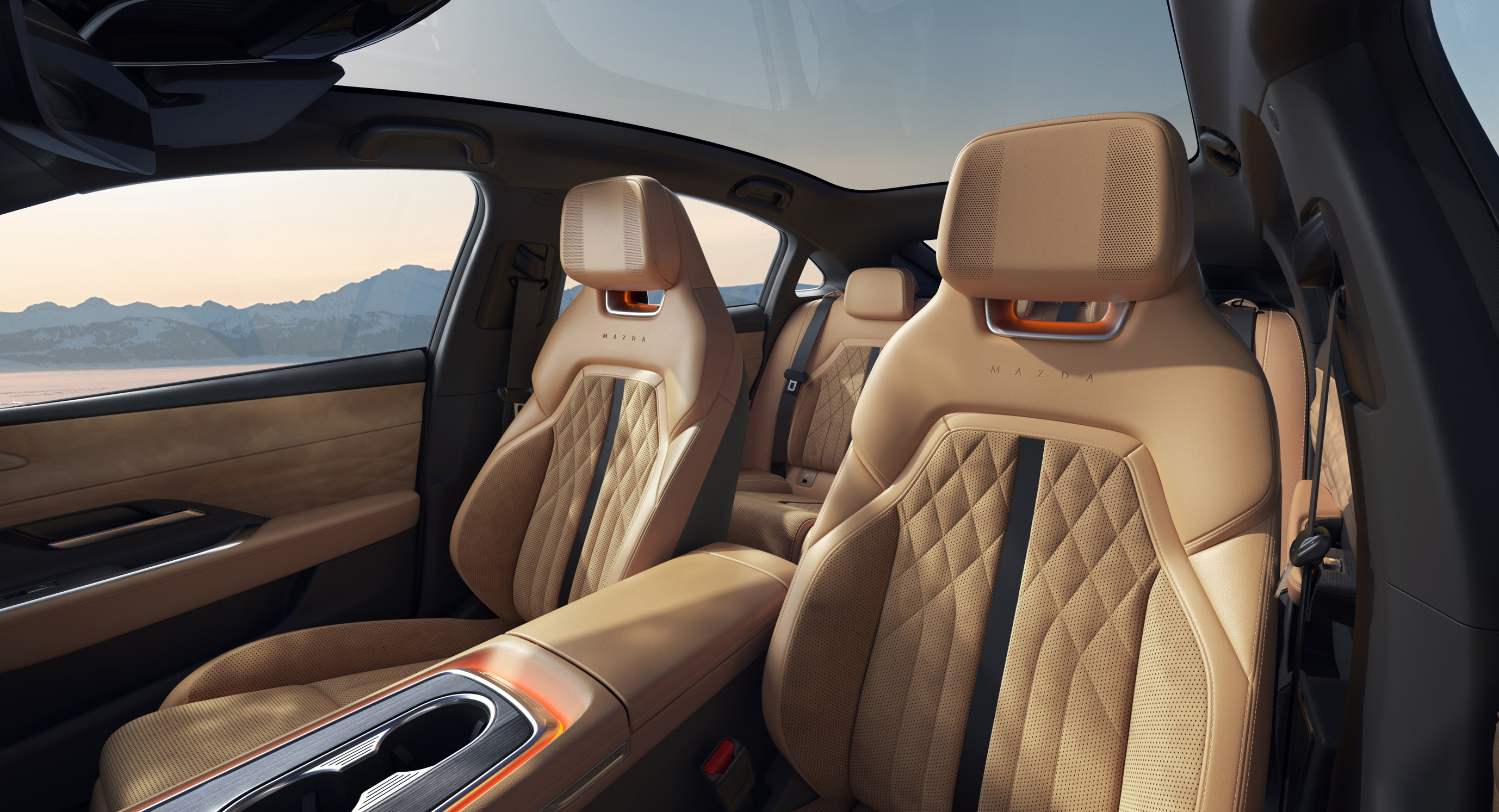 Tan quilted leather seats in a Mazda vehicle interior.