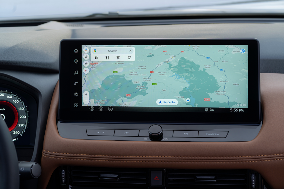 Car dashboard with GPS navigation screen showing a map.