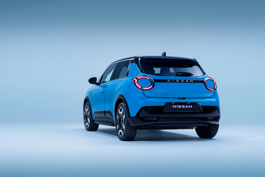 Blue Nissan Micra car viewed from the rear.