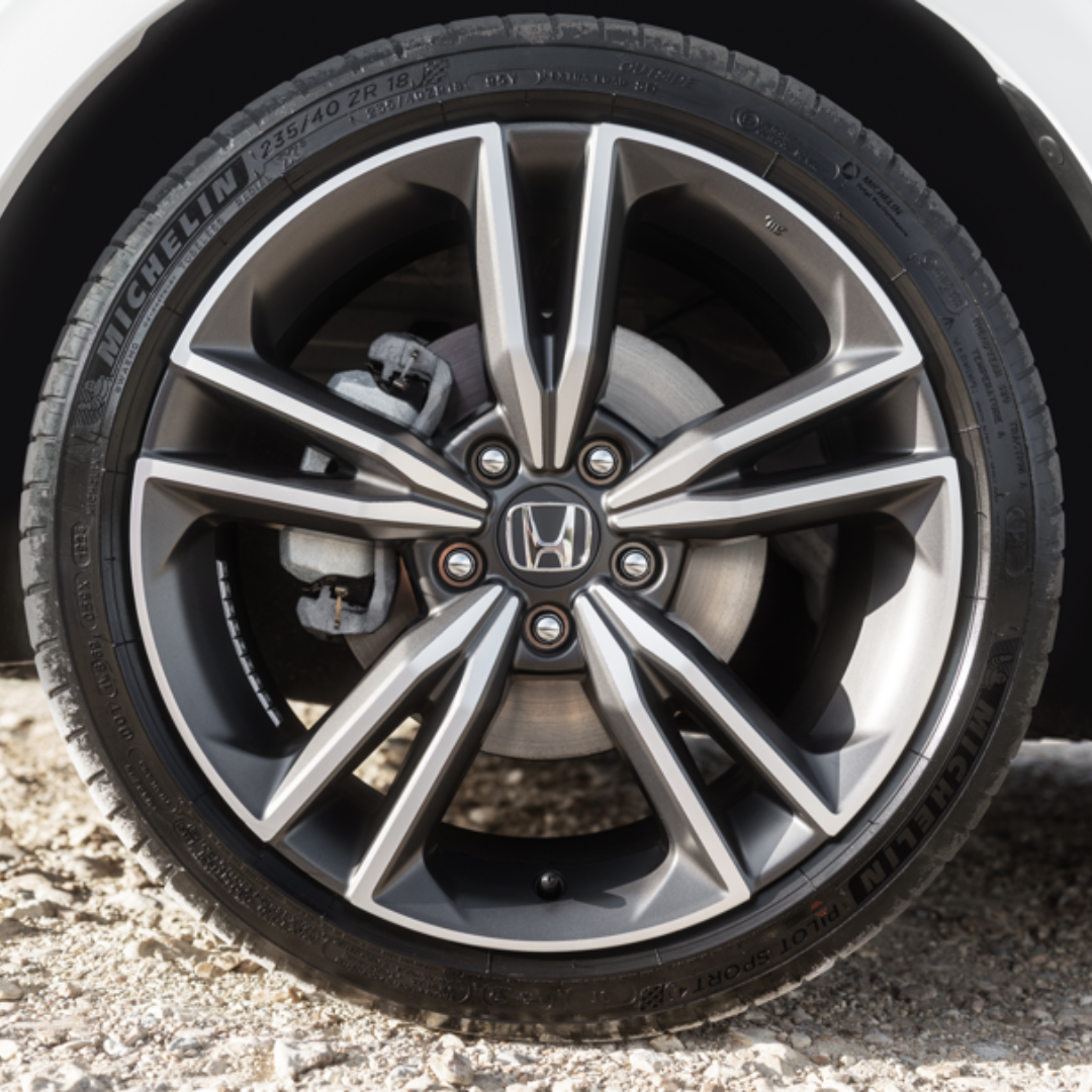 Close-up of a Honda car wheel with a Michelin tyre.